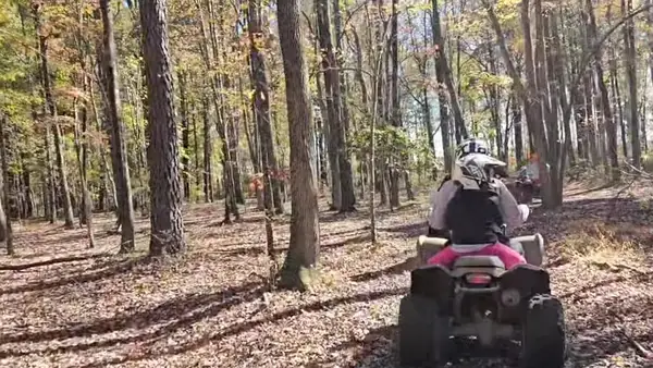 Riders on a wooded ATV trail at NJ ATV Rentals