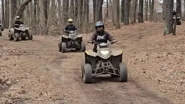 Riders on a wooded ATV trail at NJ ATV Rentals