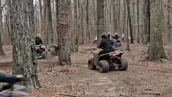 ATV group riding through the woods at NJ ATV Rentals