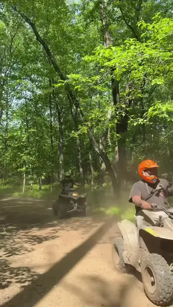 Smiling riders on an NJ ATV tour at NJ ATV Rentals