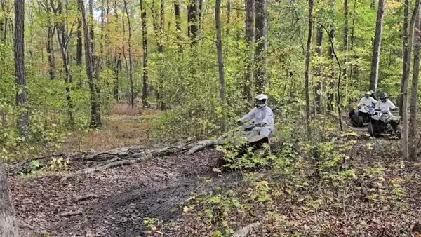 ATV group riding through the woods at NJ ATV Rentals